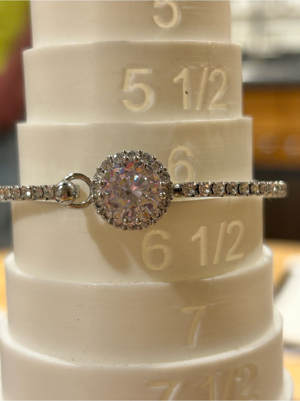 Silver-Tone Halo Tennis Bracelet with Sparkling Round Center Stone